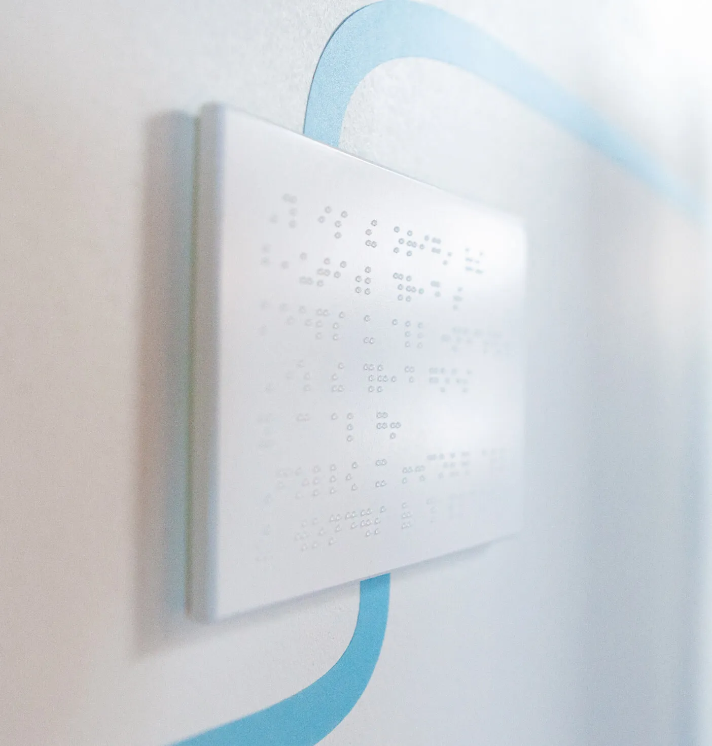 Close-up of braille signage.